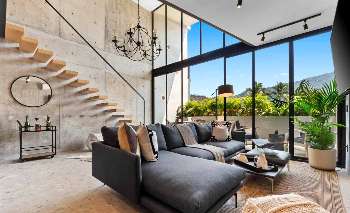Double-height living with the floating stair