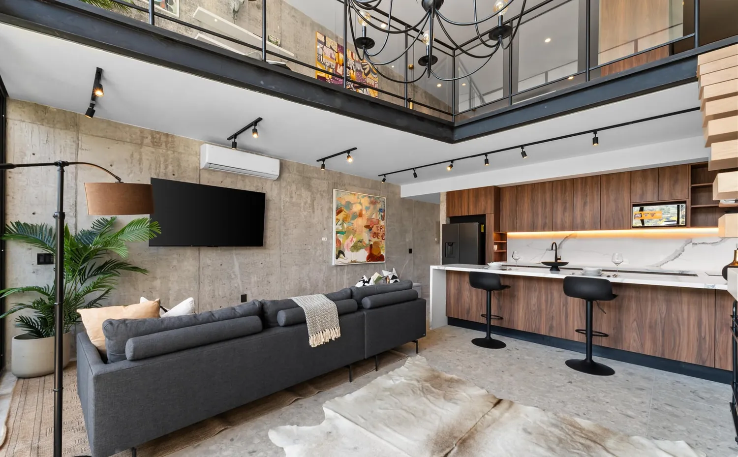 The great room — double-height living and open kitchen